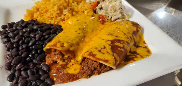 "No Rules" Mexican Combinations: two ground beef enchiladas, black beans and rice at Madaline's Grill, Redmond Oregon