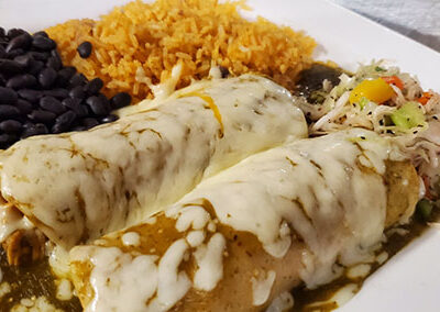 "No Rules" Mexican Combinations: 2 chicken enchiladas, verde, black beans and rice at Madaline's Grill, Redmond Oregon